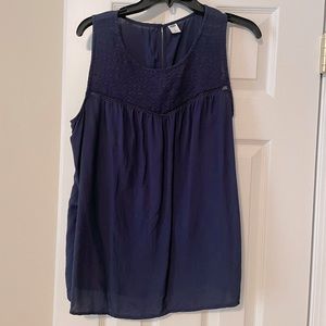 Navy tank top with lace details. Size L.